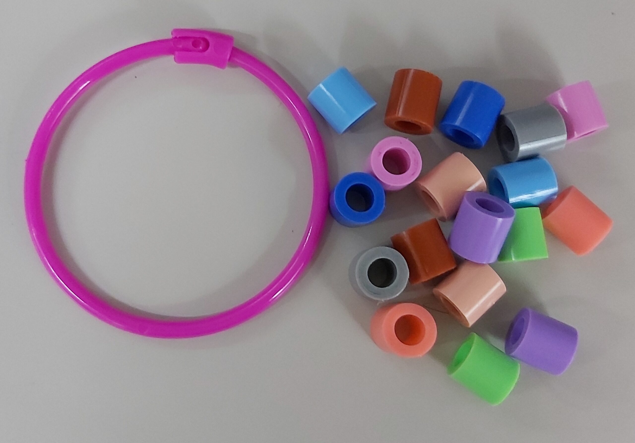 Montessori Practical Life Activity 1: Putting Through - Image 2