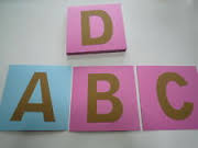 Sandpaper letter UC.jpg